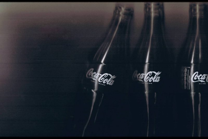 3 glass bottles of coca cola