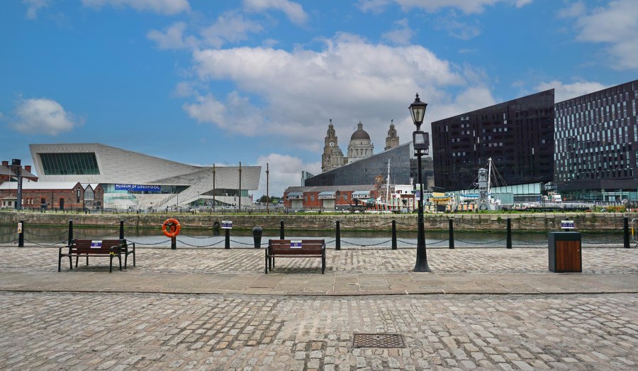 a photo across the Kings Dock in Liverpool with the Museum of Liverpool in the distance