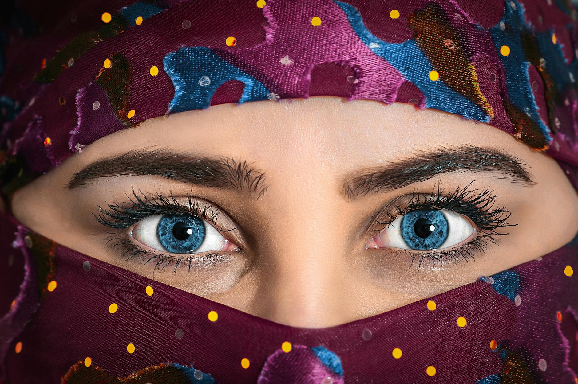 blue eyes of a lady in a burka